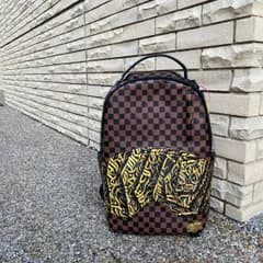 特別限定コラボ SPRAYGROUND スプレイグラウンド DIAA ALLAM ディアアラム アラビア書道 バックパック 茶